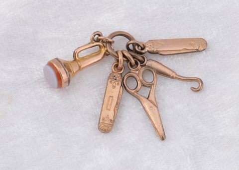 A 9ct gold chatelaine charm