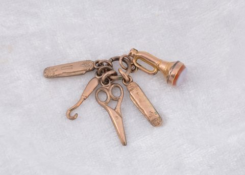 A 9ct gold chatelaine charm