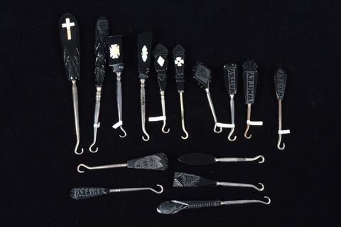 A collection of 19th and 20th Century Whitby jet handled button and glove hooks