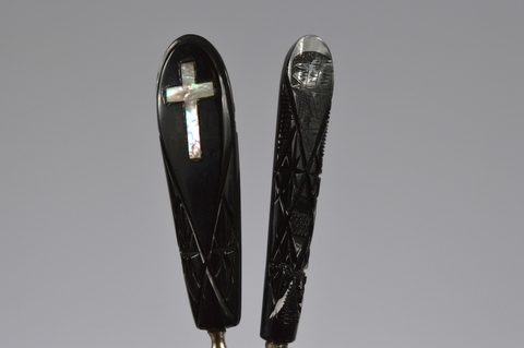 A collection of 19th and 20th Century Whitby jet handled button and glove hooks