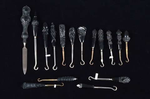 A collection of 19th and 20th Century Whitby jet handled button and glove hooks