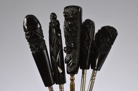 A collection of 19th and 20th Century Whitby jet handled button and glove hooks