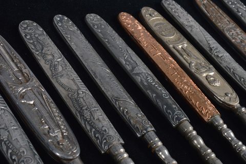 A collection of 19th Century steel and brass flattened souvenir button hooks