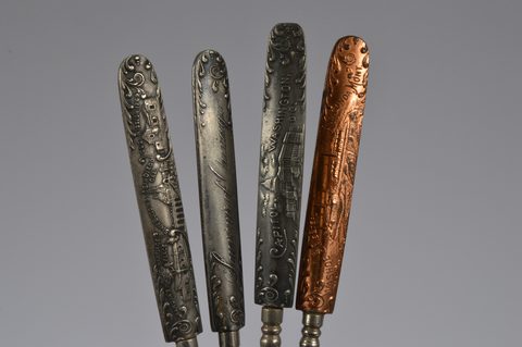 A collection of 19th Century steel and brass flattened souvenir button hooks