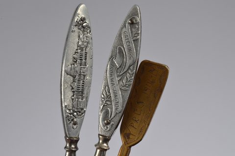 A collection of 19th Century steel and brass flattened souvenir button hooks