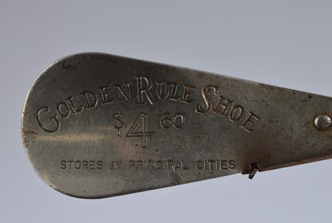 A collection of advertising steel combination button hook and shoehorns
