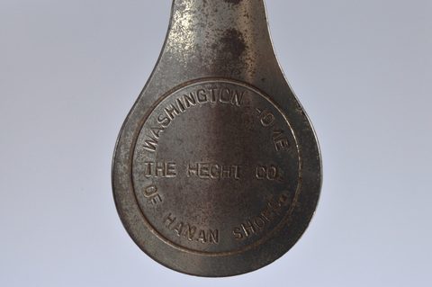 A collection of advertising steel combination button hook and shoehorns
