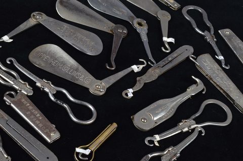 A collection of retractable hinged advertising steel button hooks