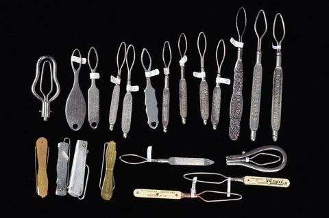 A collection of steel advertising button loops