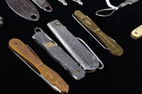A collection of steel advertising button loops