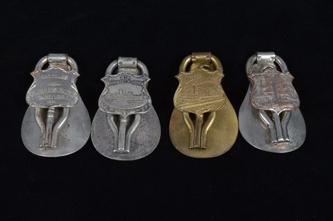 A collection of steel and brass 19th Century folding commemorative or souvenir shoehorn button hooks