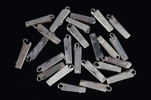 A collection of steel hinged retractable advertising button hook key rings