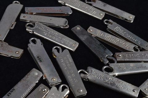 A collection of steel hinged retractable advertising button hook key rings