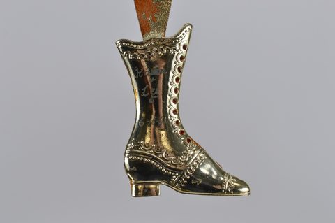 A collection of ten steel and brass boot terminal shoe horns