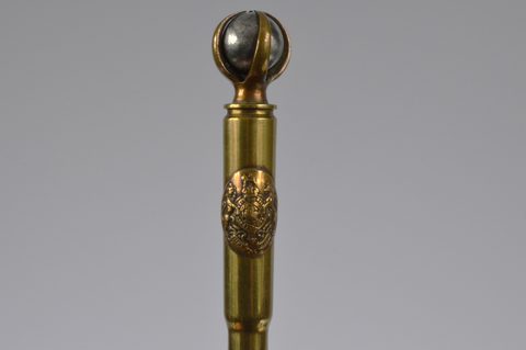 A collection of thirteen trench art Royal Engineers 'Honi soit qui mal y pense' cypher mounted converted shell button hooks