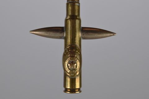 A collection of trench art converted shell button hooks