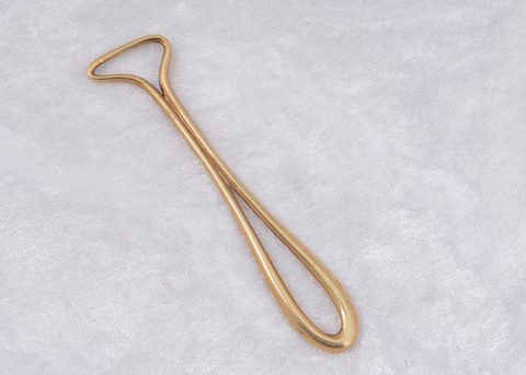 A continental art deco 14k marked button loop