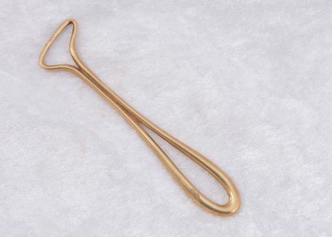 A continental art deco 14k marked button loop