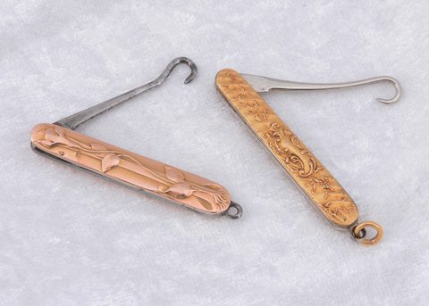 A continental art nouveau gold covered folding button hook