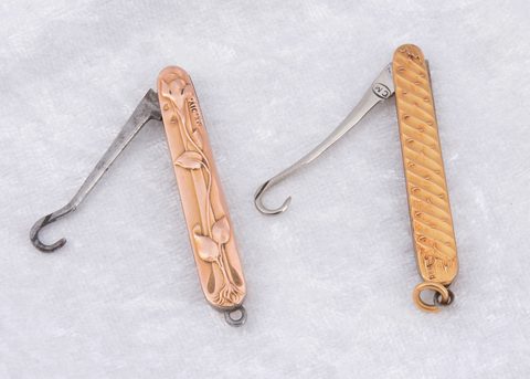 A continental art nouveau gold covered folding button hook