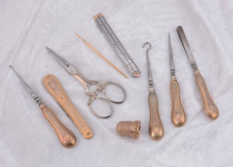 A continental gilt metal and steel travelling set