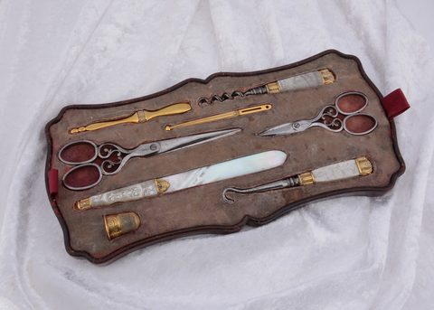 A mother of pearl and gilt metal continental dressing table set