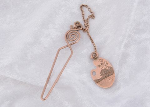 A novelty fob and loop button hook