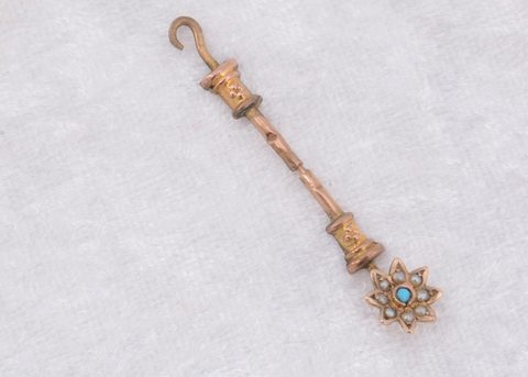 A novelty Victorian stick pin button hook