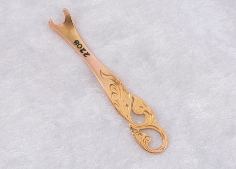 A Tiffany & Co yellow metal art nouveau button hook