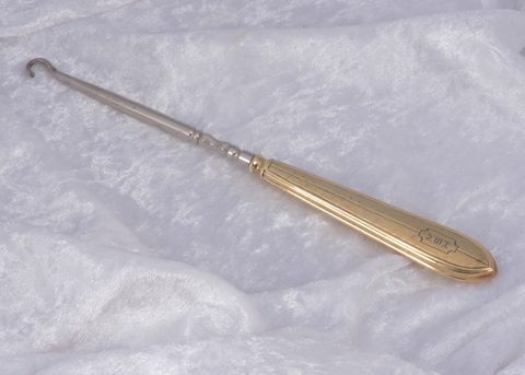 An American 14k marked art deco handled button hook