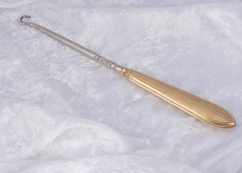 An American 14k marked art deco handled button hook