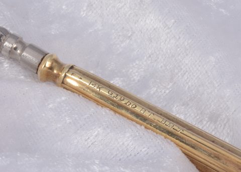 An American 14k marked art deco handled button hook
