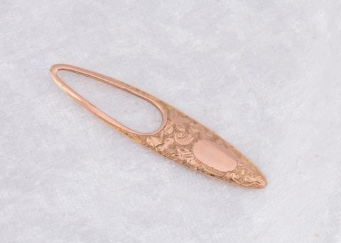 An Edwardian 9ct gold Sampson Mordan & Co ovoid button loop