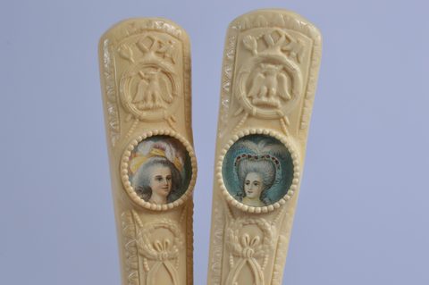 Eight cased Victorian and later bone and resin dressing table sets