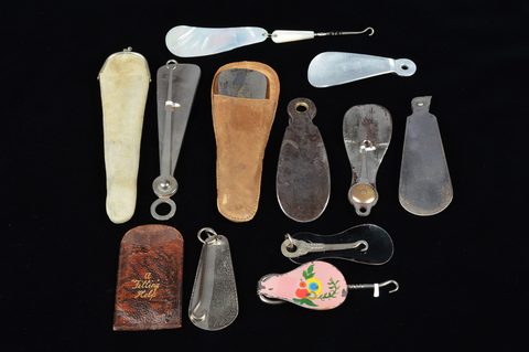 Eleven combination shoehorn and button hooks