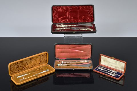 Four cased dressing table sets