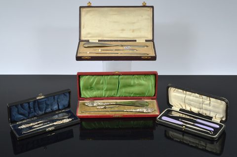 Four cased three piece dressing table sets