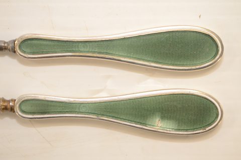 Four sets of matching guilloche enamel silver handled button hooks and shoehorns