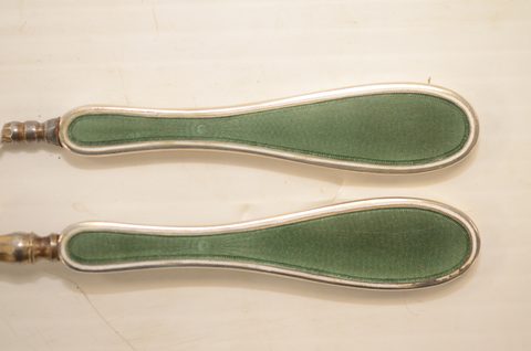 Four sets of matching guilloche enamel silver handled button hooks and shoehorns