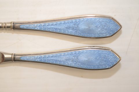 Four sets of matching guilloche enamel silver handled button hooks and shoehorns