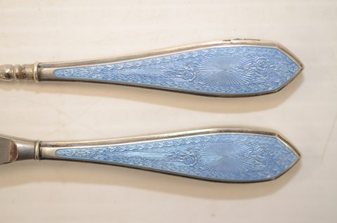 Four sets of matching guilloche enamel silver handled button hooks and shoehorns