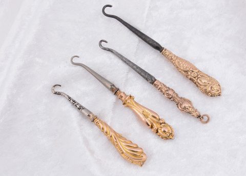 Four Victorian 9ct gold button hooks