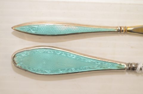 Nine guilloche enamel handled shoehorns