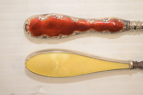 Nine guilloche enamel handled shoehorns