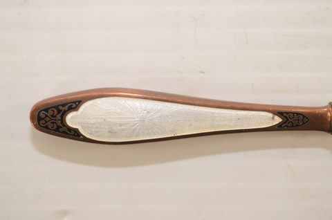 Nine guilloche enamel handled shoehorns