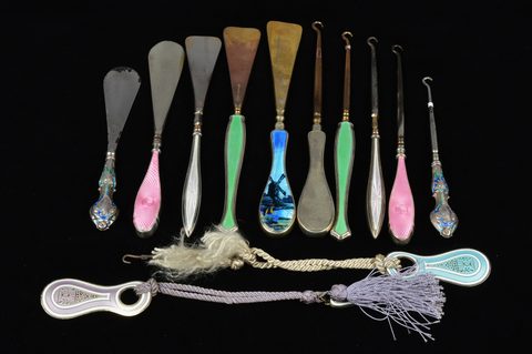 Seven sets of matching button hooks and shoehorns