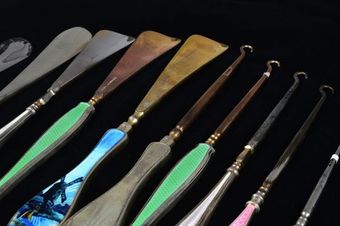 Seven sets of matching button hooks and shoehorns