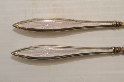 Seven sets of matching button hooks and shoehorns