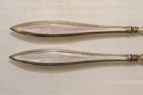 Seven sets of matching button hooks and shoehorns