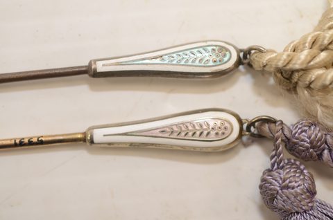 Seven sets of matching button hooks and shoehorns